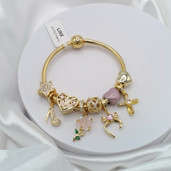 Linx Yellow Gold Snake Chain Bracelet with Pink Religious Themed Charms